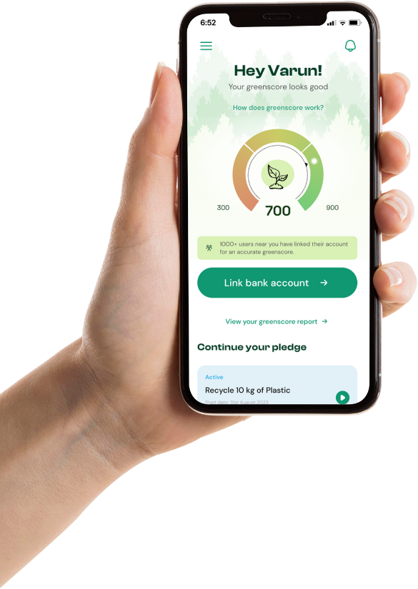 Phone showing Green Score in palm